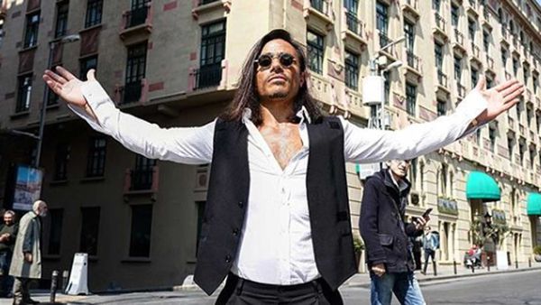 Salt Bae poses in front of his new hotel, the Park Hyatt Hotel Istabul