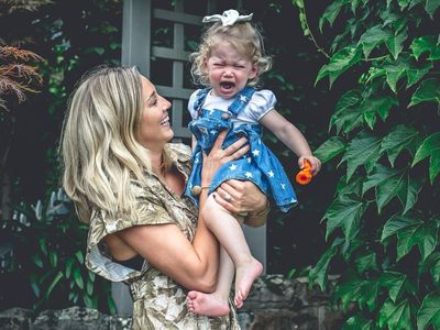 Jasmine Stefanovic is every parent trying to get a family photo with a toddler