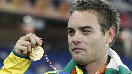 Jarrod Bannister poses with his gold medal 
 during the Commonwealth Games in New Delhi, India, October, 2010 (AAP).
