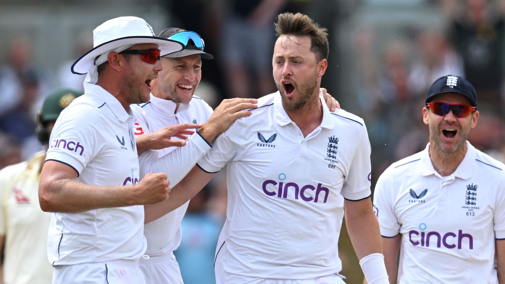 Ollie Robinson of England celebrates bowling Usman Khawaja of Australia with team mates during Day Three of the first Ashes Test match between England and Australia at Edgbaston.
