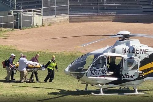 In this still image from video, author Salman Rushdie is taken on a stretcher to a helicopter for transport to a hospital after he was attacked during a lecture at the Chautauqua Institution in Chautauqua, N.Y., Friday, Aug. 12, 2022.