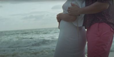 Chrissy Teigen shows her baby bump in the music video for Wild.