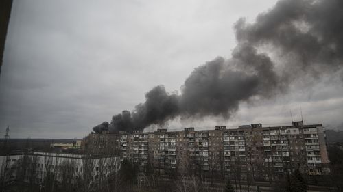 Smoke rise after shelling by Russian forces in Mariupol, Ukraine, Friday, March 4, 2022.