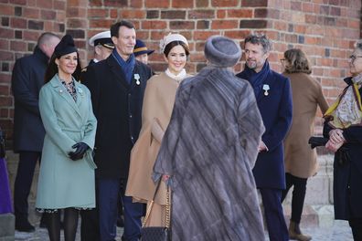 Denmark Queen Margrethe talks to Princess Marie, Prince Joachim, Crown Princess Mary and Crown Prince Frederik after a visit to her father King Frederik IXs grave  outside Roskilde on the day of her golden jubilee, January 2022.
