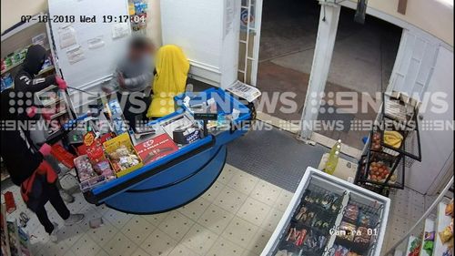 The two men entered the shop in Sydney's west at about 7.30pm last night.