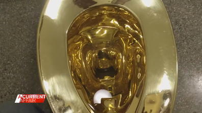 The $6 million solid gold loo was an art piece titled 'America' - exhibited by ﻿controversial installation artist Maurizio Cattelan.