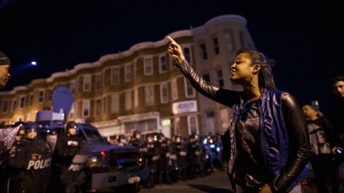 Protesters defy police in Baltimore. (AFP)