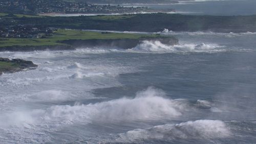 Huge swell batters NSW coast