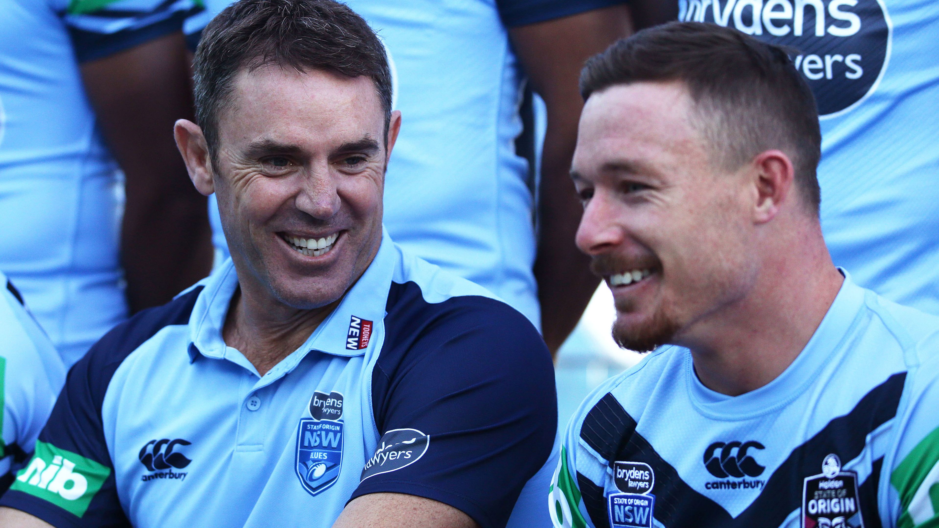 Blues coach Brad Fittler and Damien Cook share a laugh during a NSW media opportunity in 2019.