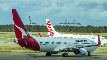 A Qantas and Virgin plane.