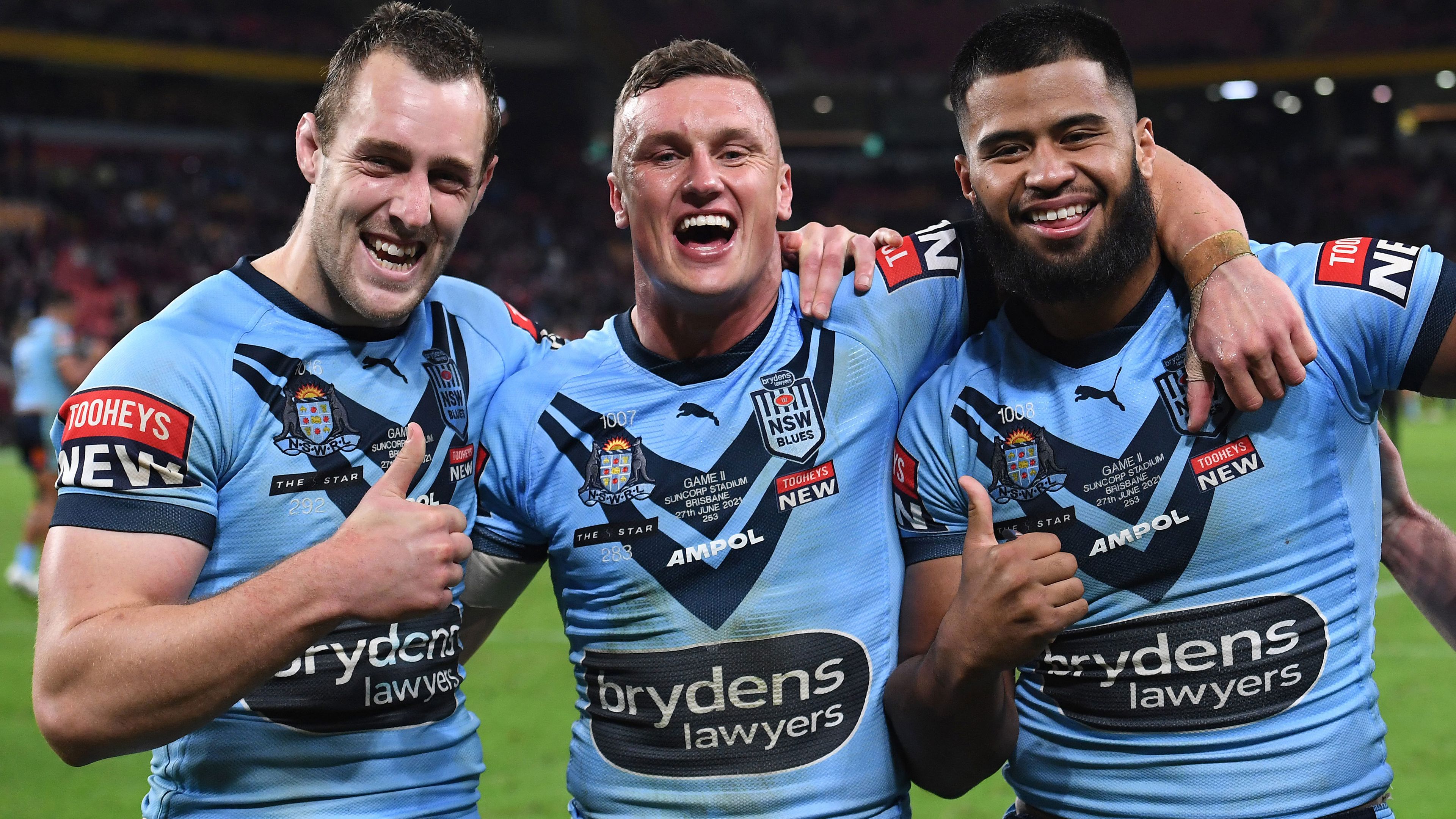 Isaah Yeo, Jack Wighton and Payne Haas celebrate after winning game two of the 2021 Origin series with NSW.