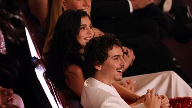 Timothée Chalamet and Kylie Jenner are seated with (L-R) Elle Fanning, Priyanka Chopra, Gwyneth Paltrow at the 2026 Oscars.