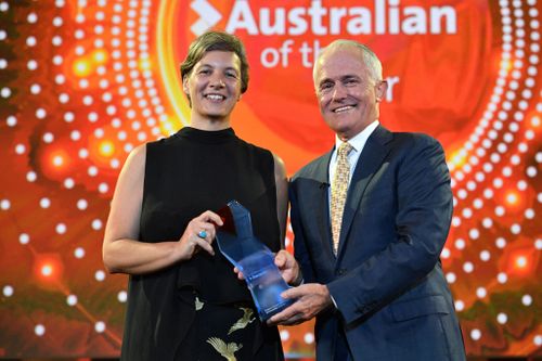 The Prime Minister presents the Australian of the Year Award in Canberra last night. (AAP)