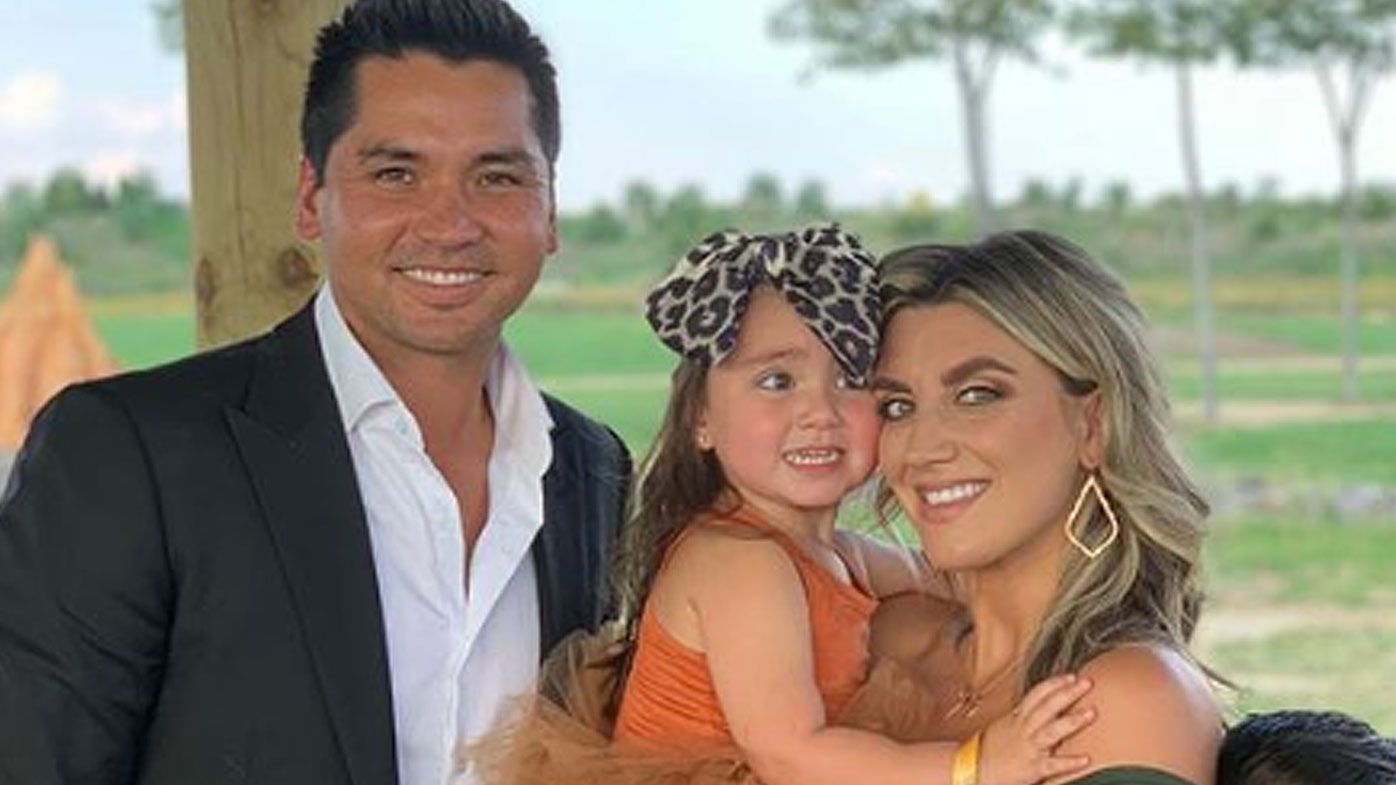 Jason Day with his wife