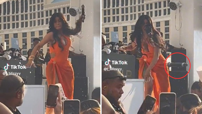 Cardi B throws microphone at fan who threw drink at her mid-performance