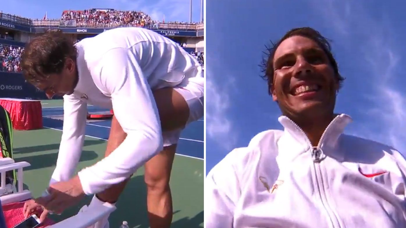 Why did Rafael Nadal check his phone following Rogers Cup victory?