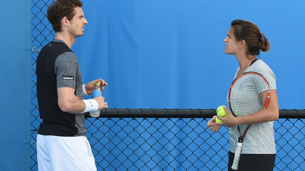 Andy Murray (L) and Amelie Mauresmo chat during a training session. (AFP)