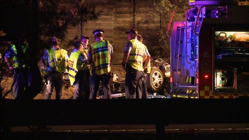 The car crashed and rolled moments after police initiated a pursuit on the M1, at Mt Colah. (9NEWS)