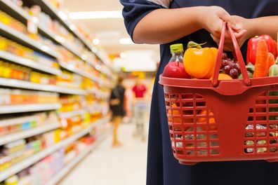 Aldi worker customers eating grapes