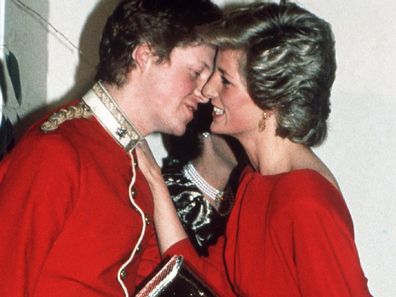 Princess Diana greets her brother Charles at a charity ball.