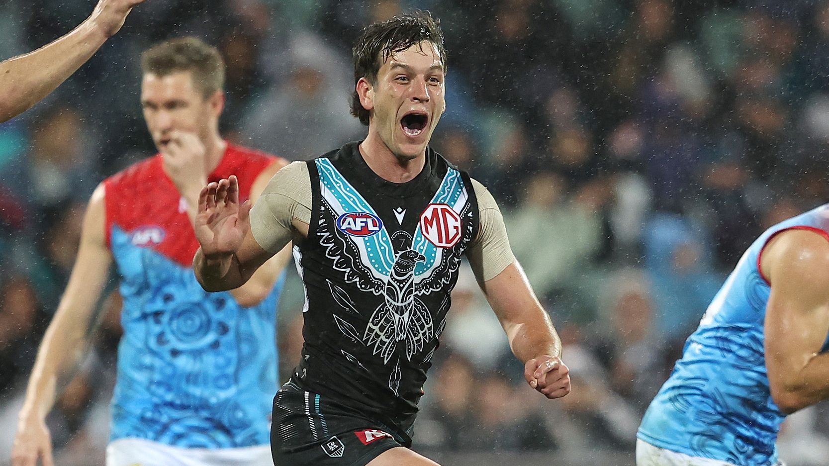 ADELAIDE, AUSTRALIA - MAY 19: Zak Butters of the Power celebrates a goal during the 2023 AFL Round 10 match between Yartapuulti/Port Adelaide Power and Narrm/Melbourne Demons at Adelaide Oval on May 19, 2023 in Adelaide, Australia. (Photo by Sarah Reed/AFL Photos)