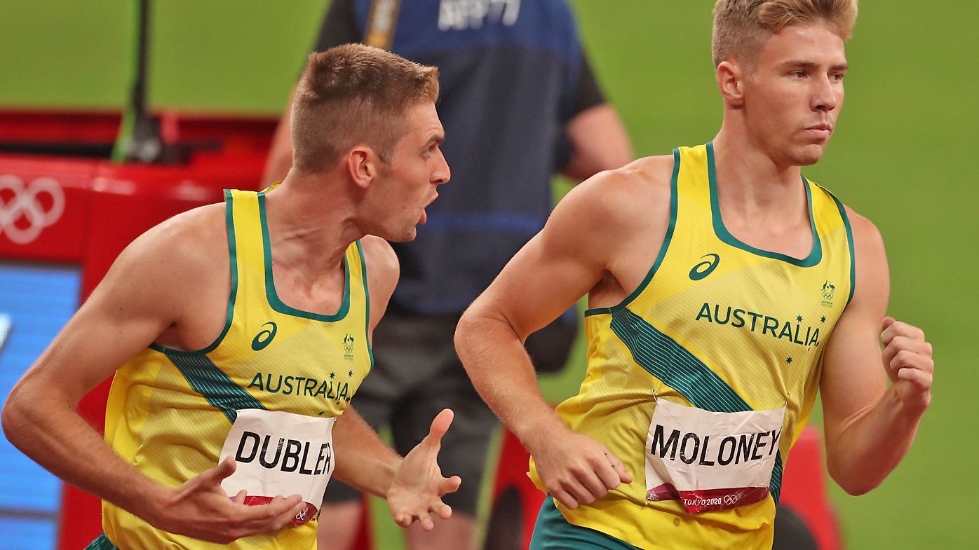 Cedric Dubler of Australia encourages his team mate and bronze medalist Ashley Moloney 
