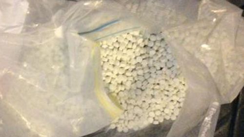 Police seize caches of illegal drugs in multiple raids across Queensland