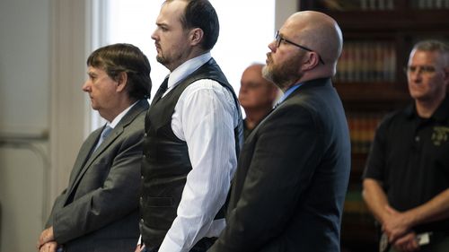 George Wagner IV stands next to attorneys John P. Parker and Richard M. Nash while he receives his sentence from Judge Randy Deering at a hearing in Waverly, Ohio. 