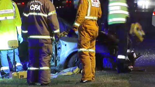 The silver sedan crashed into the median strip on the Monash Freeway at Dandenong North. (9NEWS)