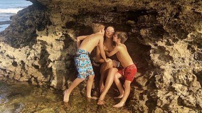 Merrin Schnabel at the beach with her two sons.