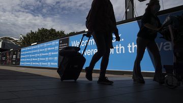 Sydney Airport international travellers tourists arrive 