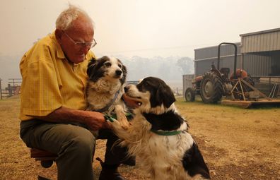 He has just been reunited with his beloved dogs when he had to leave. (AAP Image/Darren Pateman) NO 