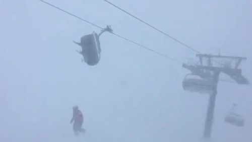 Other skiers watched on as the lift shook. (Facebook)