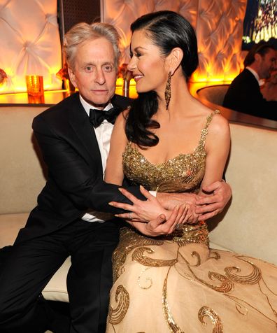 Michael Douglas and Catherine Zeta-Jones attends the 2013 Vanity Fair Oscar Party hosted by Graydon Carter at Sunset Tower on February 24, 2013 in West Hollywood, California.