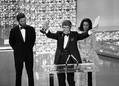 Composer Burt Bacharach accepts the Oscar for Best Original Score for "Butch Cassidy and the Sundance Kid" at the Academy Awards in Los Angeles on April 7, 1970. 