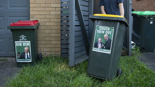 Peter Rickwood has anti Scott Morrison / Barnaby Joyce stickers on his bins. The Philip Ruddock-led Hornsby Council has sent him a letter threatening not to collect his rubbish if the stickers aren't removed. 22nd March 2022, Photo: Wolter Peeters, The Sydney Morning Herald.