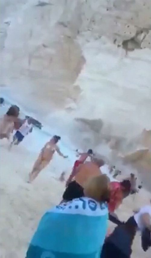 Video footage shows terrified beach goers running.