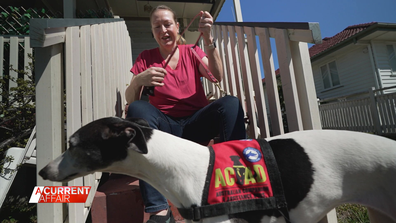 Disability Pensioner Amy Grigg-Lesina and her assistance dog Coco