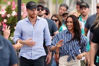 Prince Harry, Duke of Sussex and Meghan, Duchess of Sussex greet the crowd at the Cruising Yacht Club of Australia on April 17, 2026 in Sydney, Australia. 