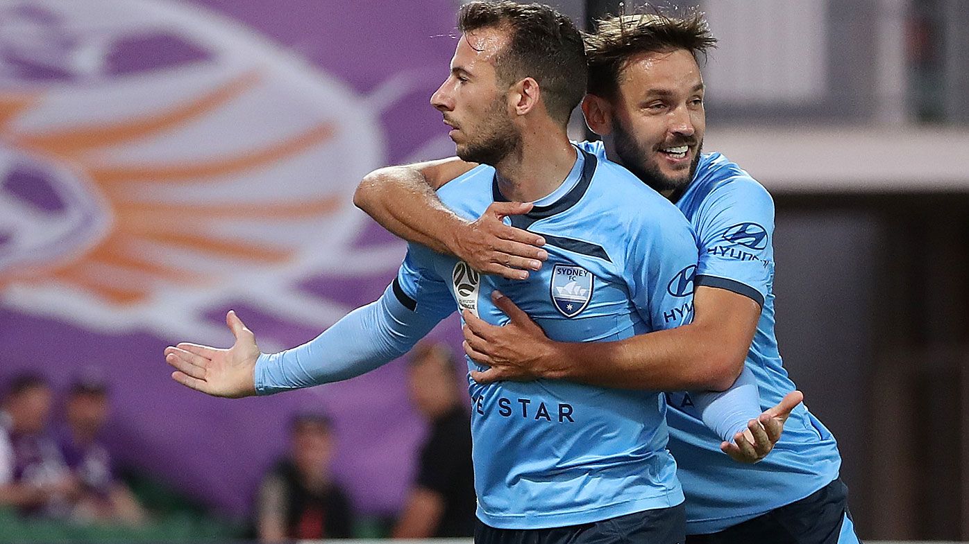 Adam Le Fondre and Milos Ninkovic of Sydney celebrate a goal 