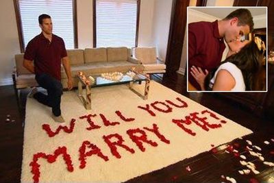 Kris surprised Kim with red rose petals spelling out 'Will You Marry Me?' in her bedroom. Kim said she was 'in shock' and 'never thought it would happen at home'. It was all captured for her reality show <i>Keeping Up With The Kardashians</i>... rumours circled that Kim 'planned' the proposal.<br/><br/>Image: E!