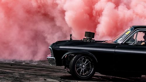 The smell of burnt rubber filled the Alice Springs Inland Dragway Burnout Pad as cars performed intricate burnouts. 