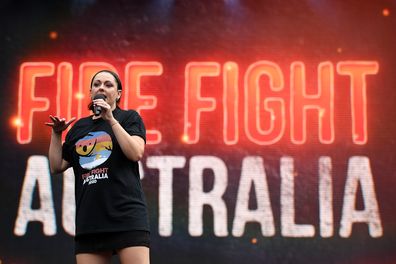 Celeste Barber speaks during the Fire Fight Australia bushfire relief concert at ANZ Stadium in Sydney, Sunday, February 16, 2020. (AAP Image/Joel Carrett)