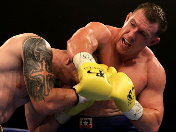 Paul Gallen throws a right at Randall Rayment during their heavyweight in January, (Getty)