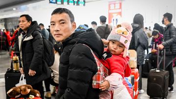 Chinese families travel to celebrate the Lunar New Year