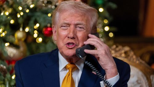 President Donald Trump speaks during a NORAD, North American Aerospace Defense Command, Tracks Santa Operation call at his Mar-a-Lago club.