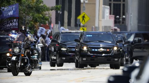 The motorcade carrying former President Donald Trump arrives near the Wilkie D. Ferguson Jr. US Courthouse, Tuesday, June 13, 2023, in Miami. 
