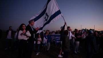 People gather for a Jewish vigil in Support of Israel at Rodney Reserve in Dover Heights on October 11, 2023.