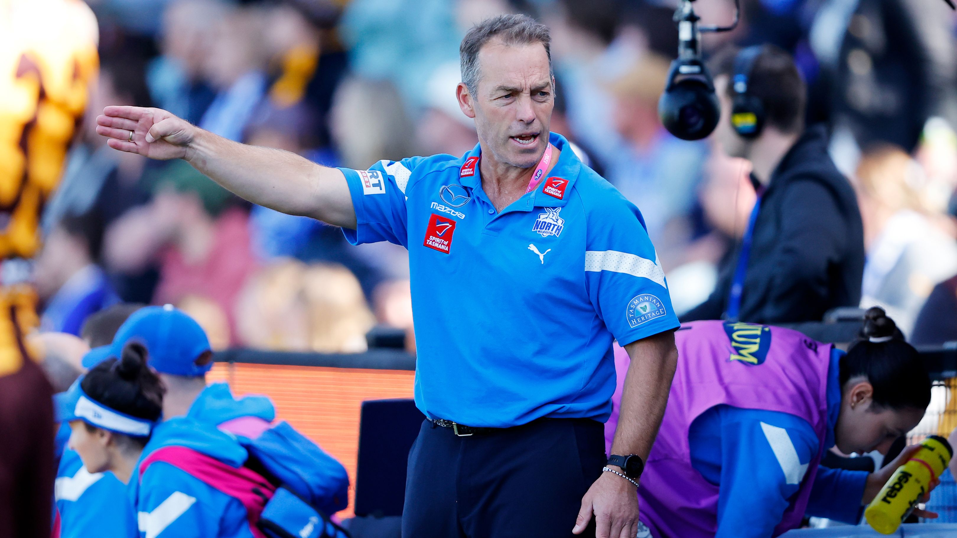 LAUNCESTON, AUSTRALIA - APRIL 01: Alastair Clarkson, Senior Coach of the Kangaroos coaches from the bench during the 2023 AFL Round 03 match between the Hawthorn Hawks and the North Melbourne Kangaroos at UTAS Stadium on April 1, 2023 in Launceston, Australia. (Photo by Dylan Burns/AFL Photos)