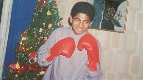 A young Sukumaran poses with boxing gloves in an old family photo. (Facebook)